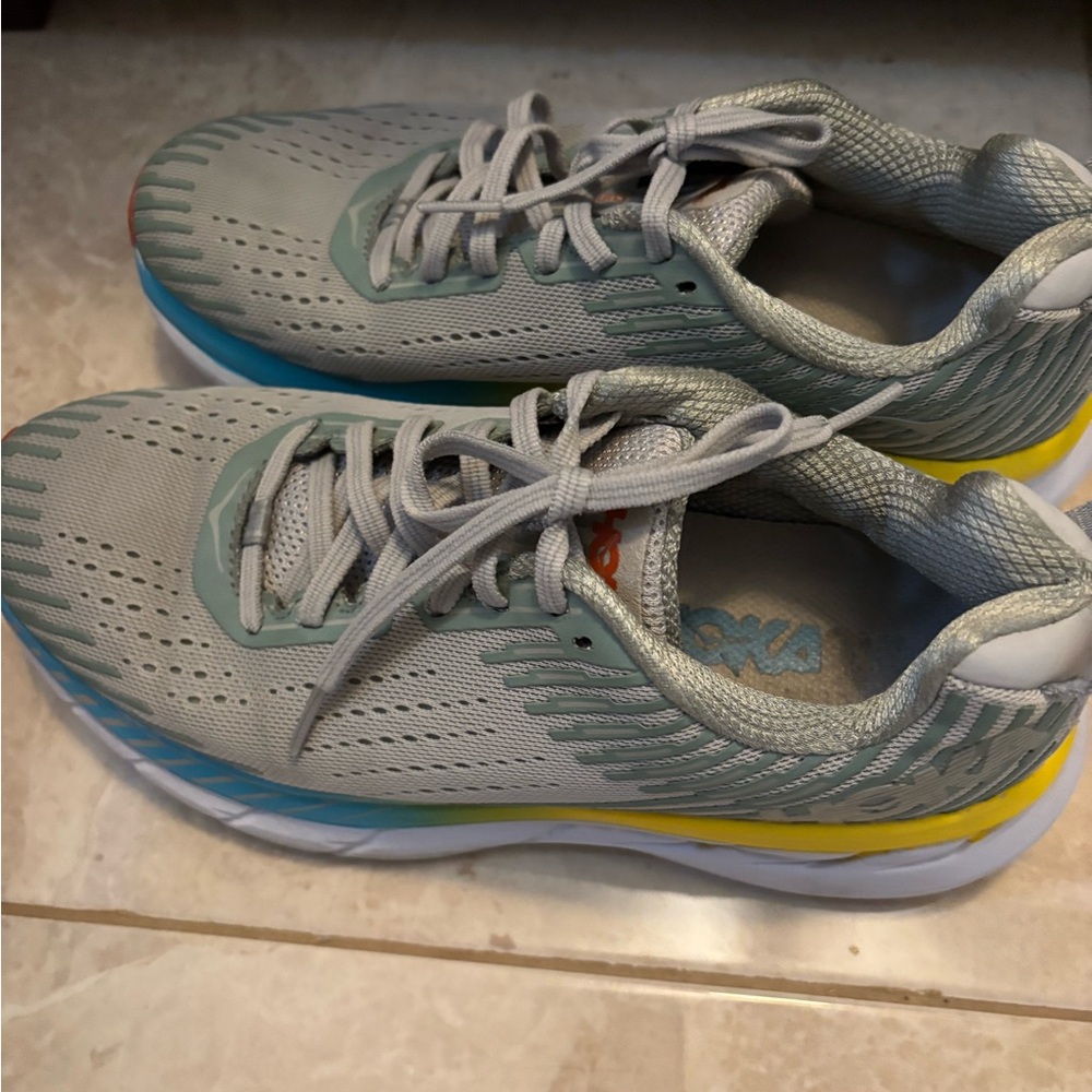 Hoka ,Looks like New the brand is Hoka One One is very comfort.